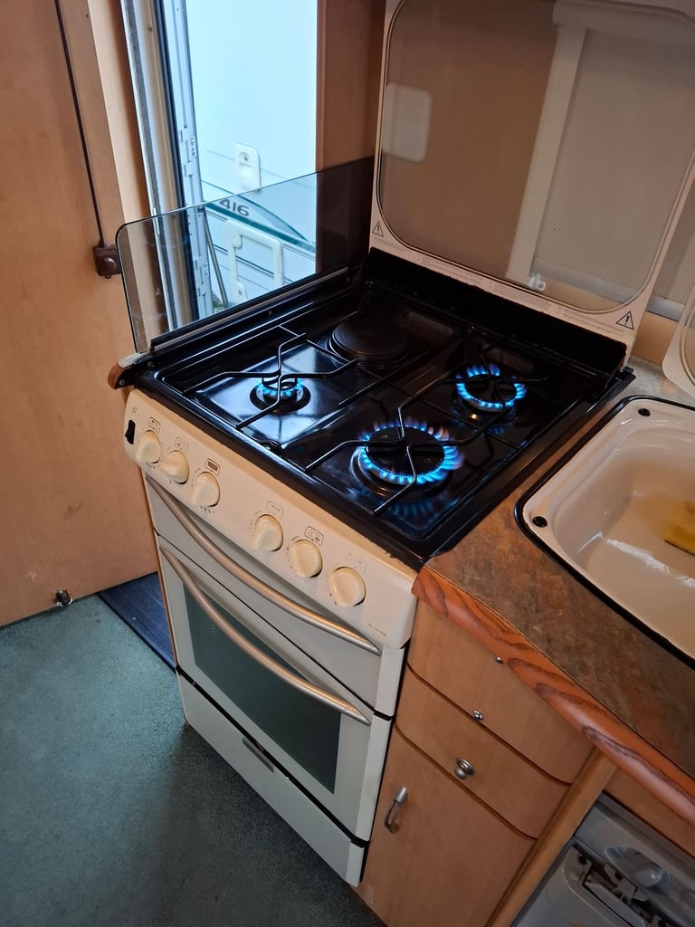 2003 Abbey Freestyle 520 SE 4 berth caravan with motor mover and solar panel