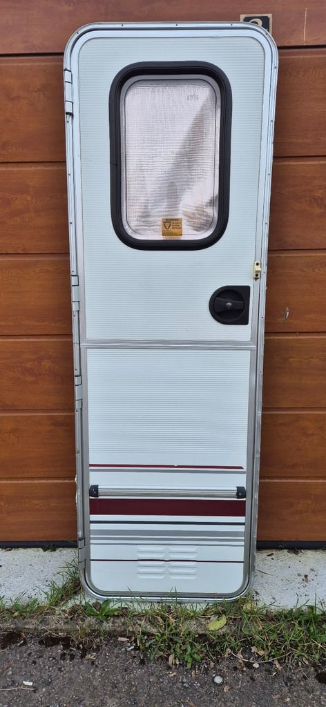Caravan main doors with frames, with or without windows, blinds locks and keys.