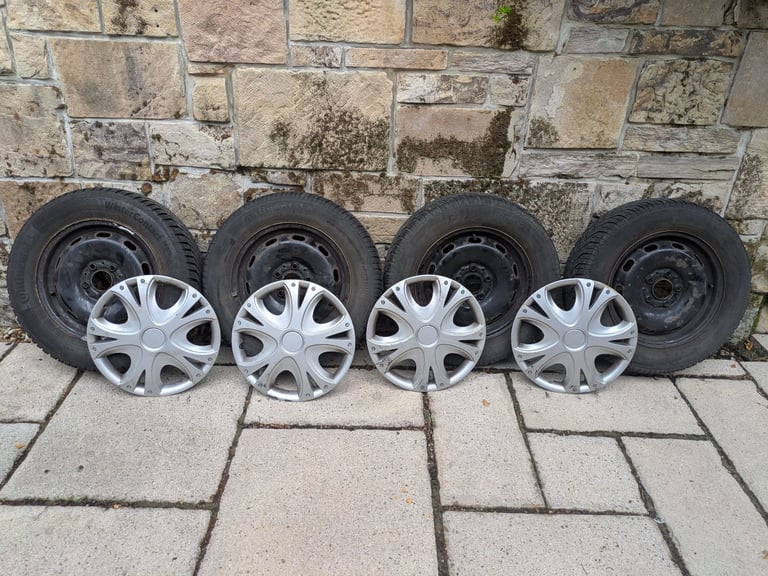 Winter Tyres 15 inch on Steel Rims with Hub Caps