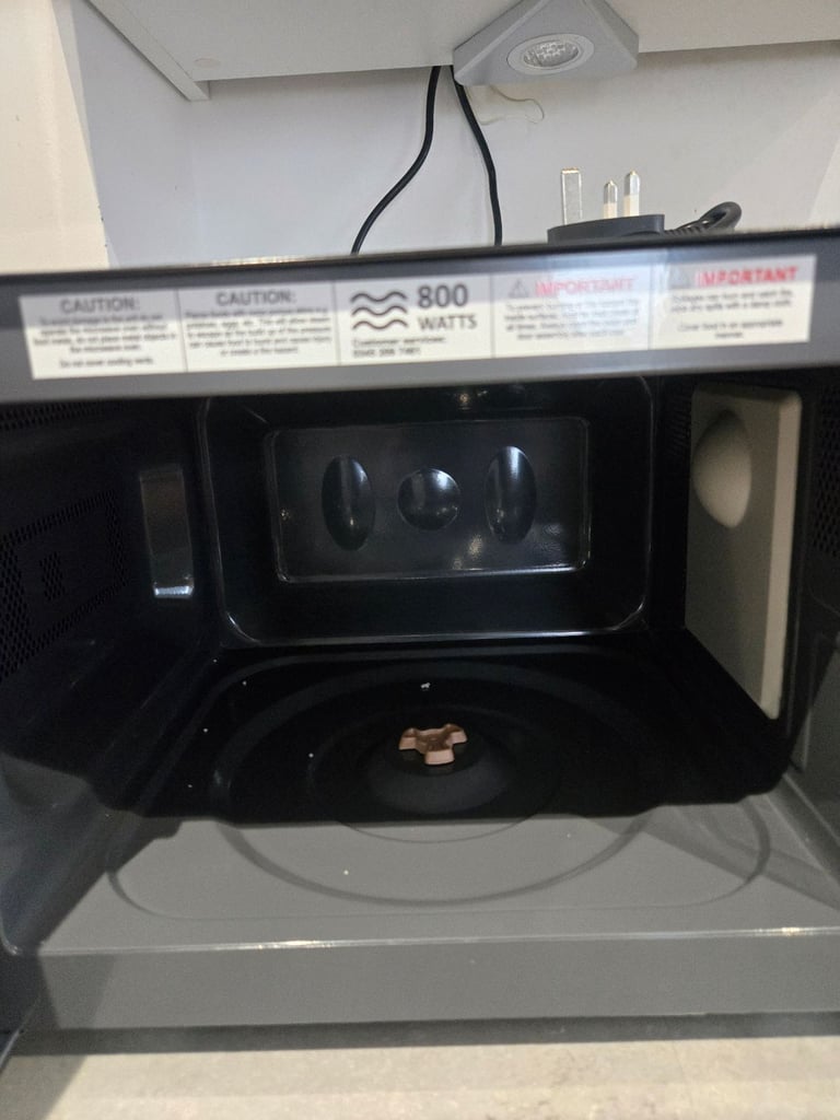 Brand new russell hobbs (rhm2060b) microwave with a small dent on the side (working perfectly)