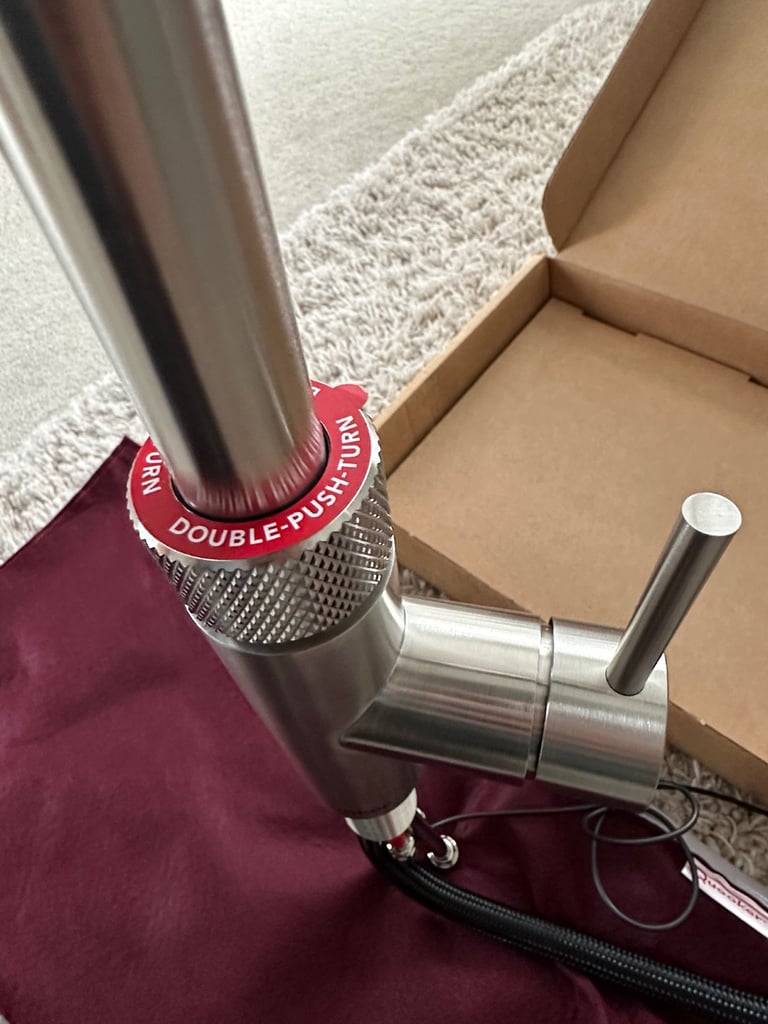 Quooker stainless steel round Fusion tap.