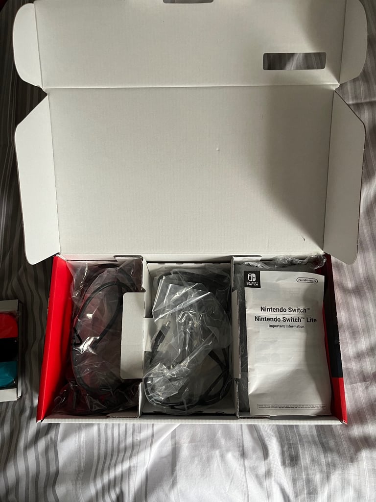 Boxed Switch 1 Neon Red & Blue with Carrier Case