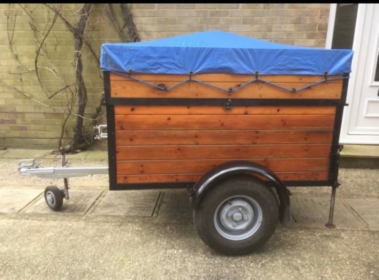 Trailer incorporating table and benches, unique design
