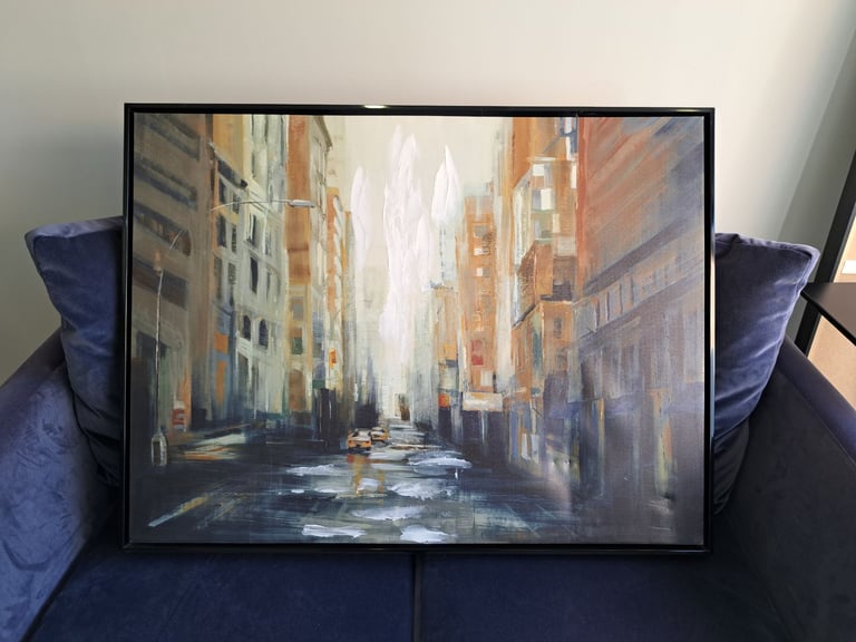 Tan white grey and black cityscape artwork 