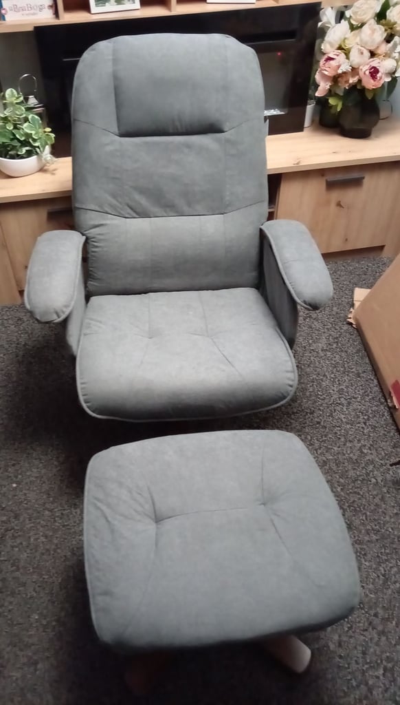 image for NEW swivel recliner chair 