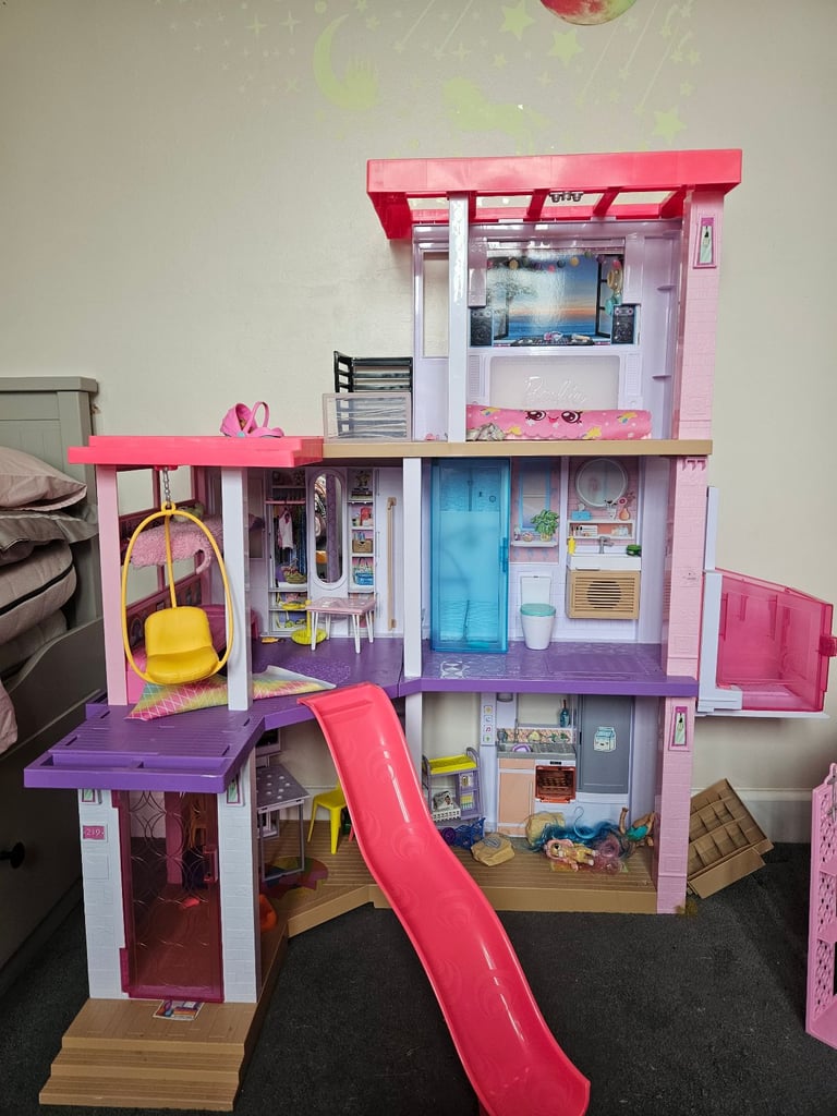 image for Barbie dreamhouse and barbie bundle