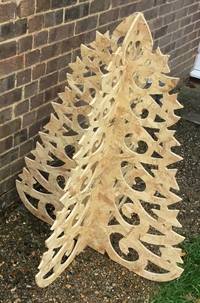 Laser cut Christmas Tree, made from Stirling board, measures 1.1m high x 1m wide at base.
