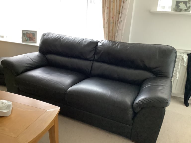Three seater and two seater leather settees 