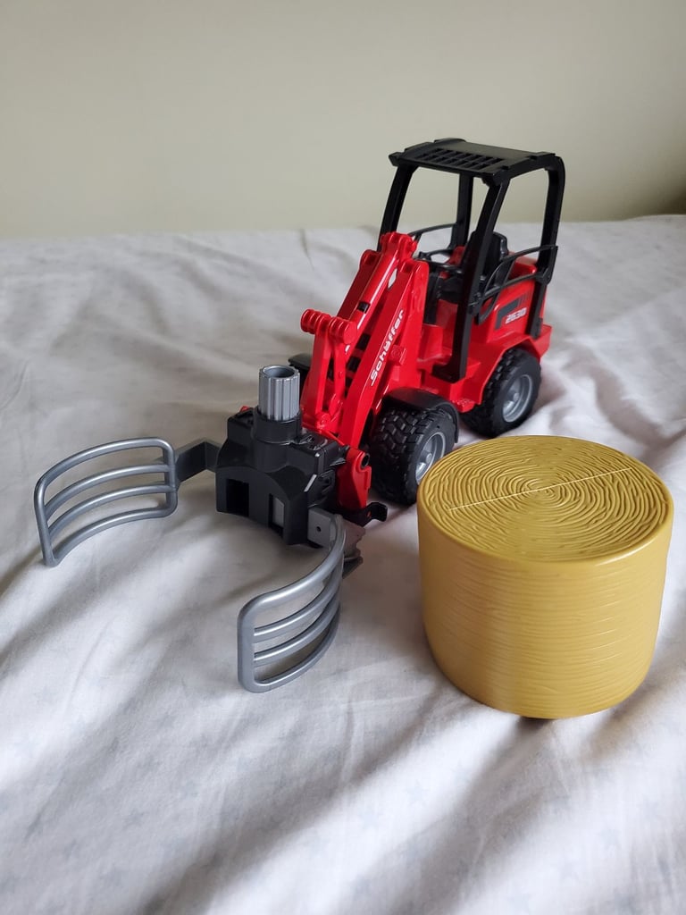 Bruder Farm Vehicle Digger With Hay Bale