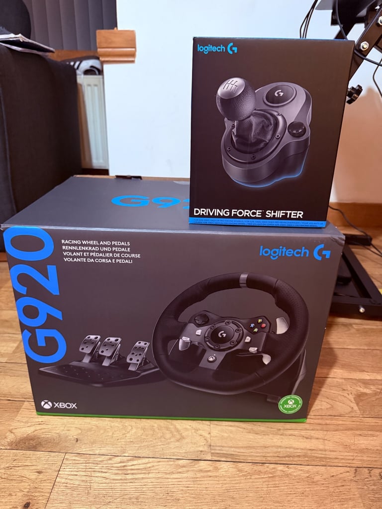Logitech g920 steering wheel with shifter, pedals and stand 
