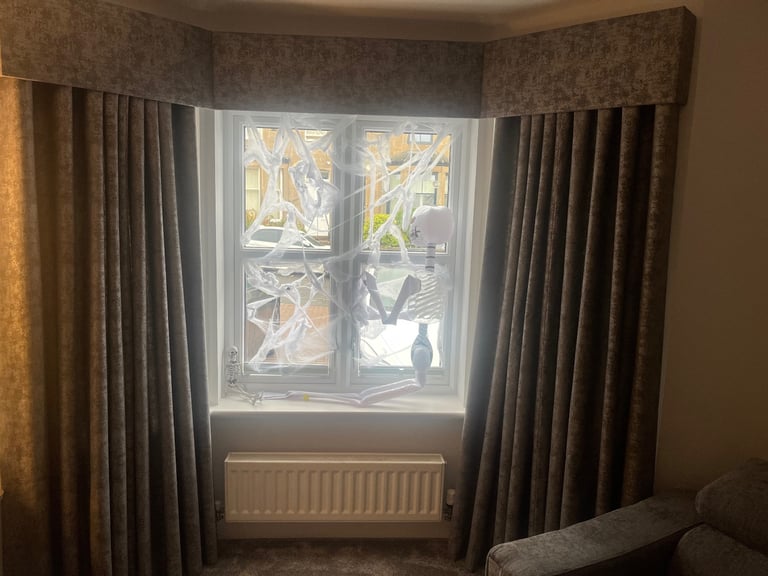Grey bay window curtains and pelmet