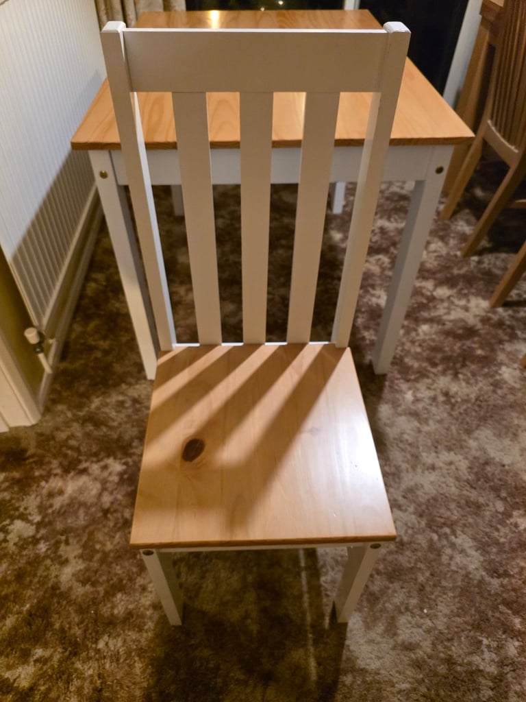 Wooden table and 4 matching chairs