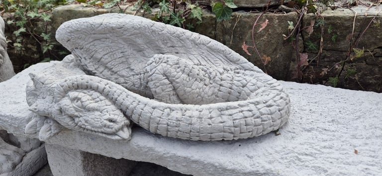 Mythical resting concrete dragon garden ornament statue