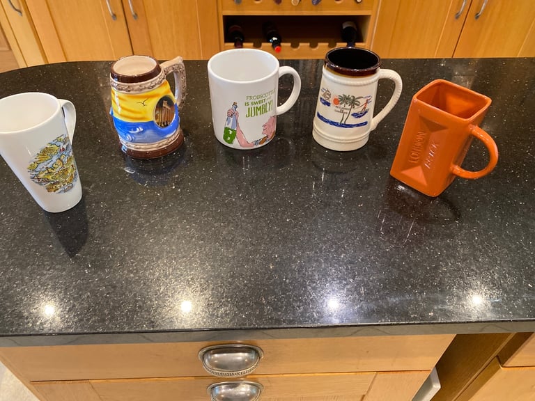 New unused selection of giant mugs each at £2