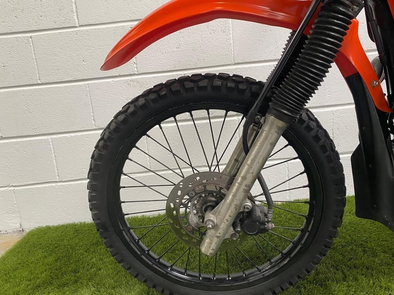 1998 JDM Suzuki DF200E enduro with large rack and headlight guard