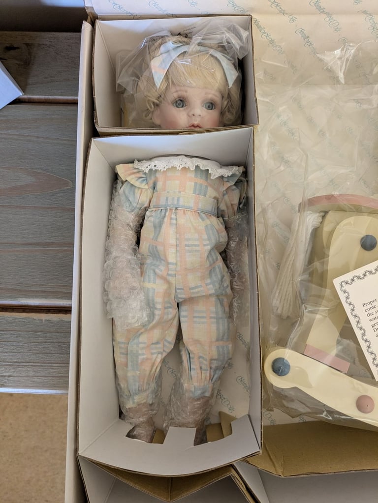 Collection of immaculate porcelein dolls 