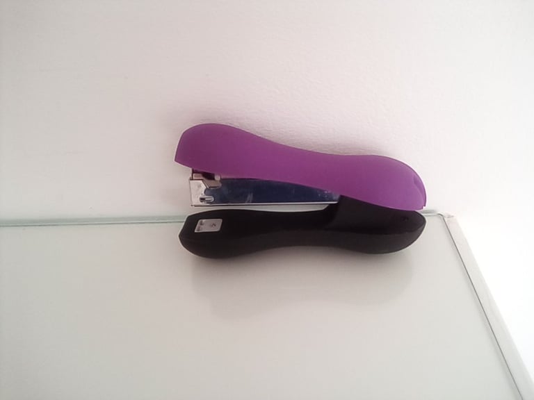 image for Purple colour stapler with staples. Office and desk Stationery.