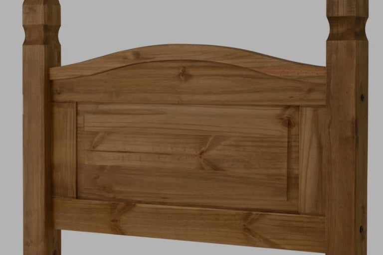 Single bed with wooden headboard