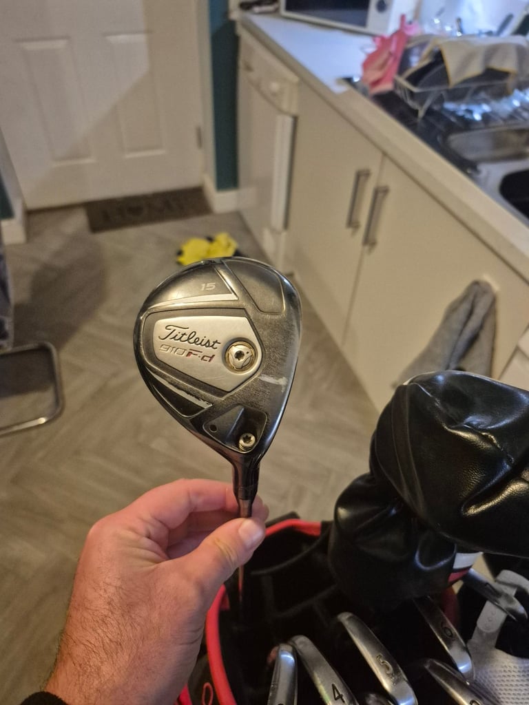 Full set titleist irons,driver, 3 wood, hybrid, mizuno rusty wedges and titleist bag 