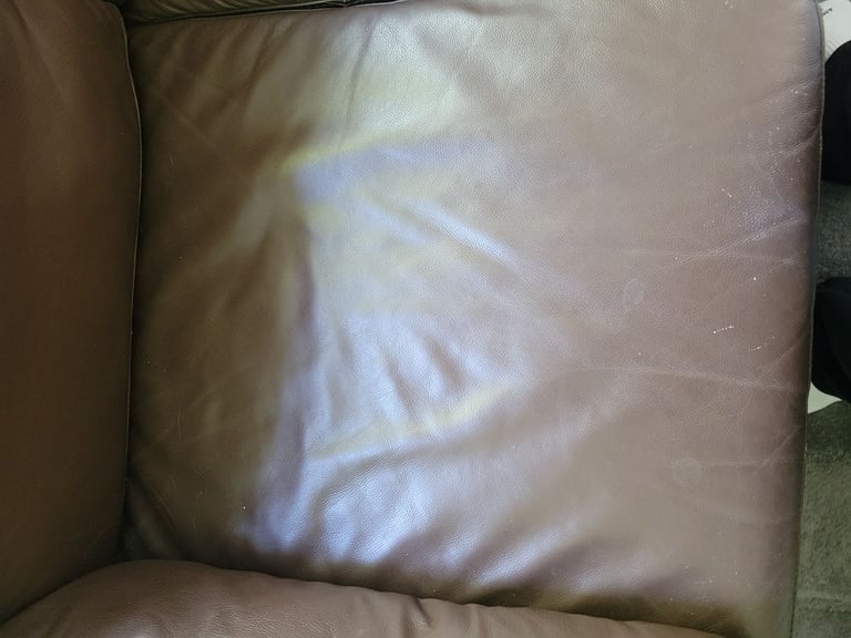 Small brown leather sofa- free