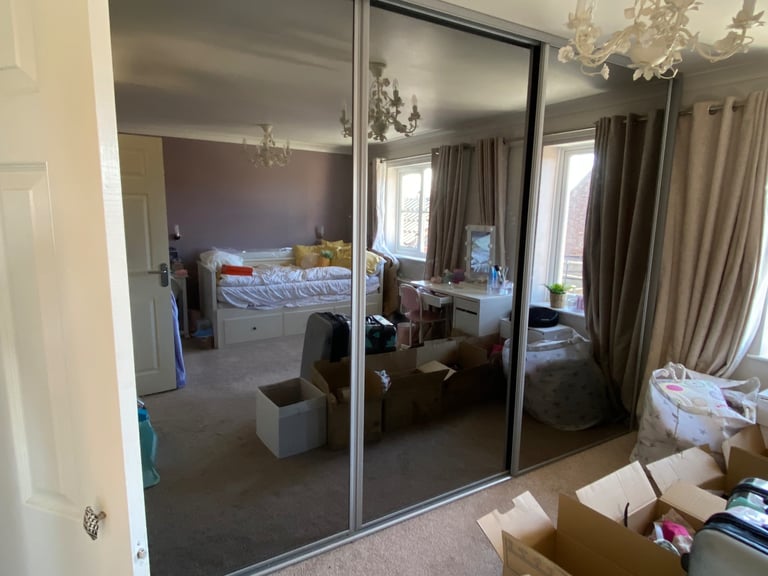 Wardrobe with mirror doors