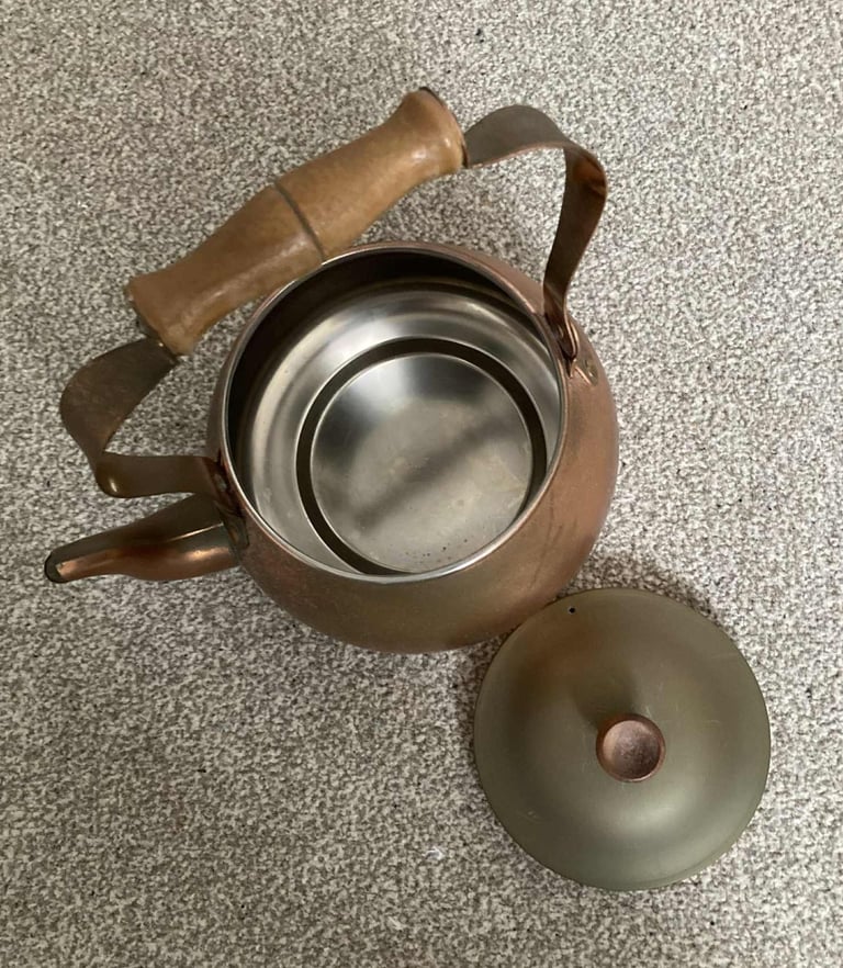 Vintage solid copper kettle with wooden handle