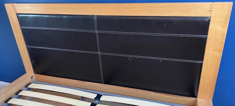 Oak King Size Wooden bed frame with four underbed wheeled drawers 