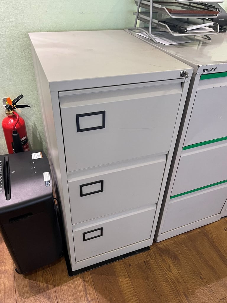 image for Lockable, metal, three-drawer filing cabinet.