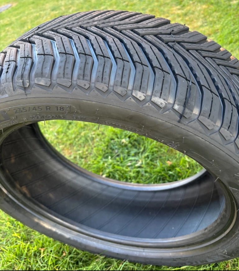 One New Michelin cross climate Tyre and One standard Budget Tyre