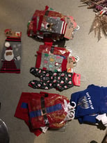 Bin bag full of Christmas dog clothes