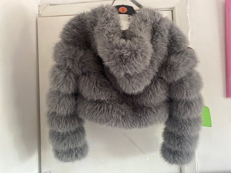 Medium  fur coat with hood