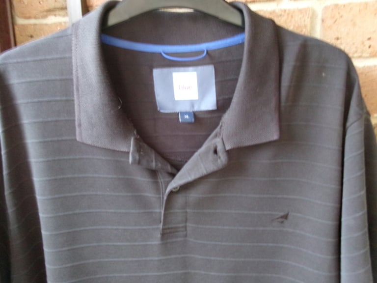 BLACK T.SHIRT. XL. PIT TO PIT 25ins 64cm.