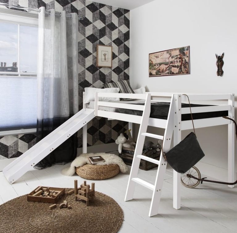 White mid-sleeper bed with slide and coat pegs