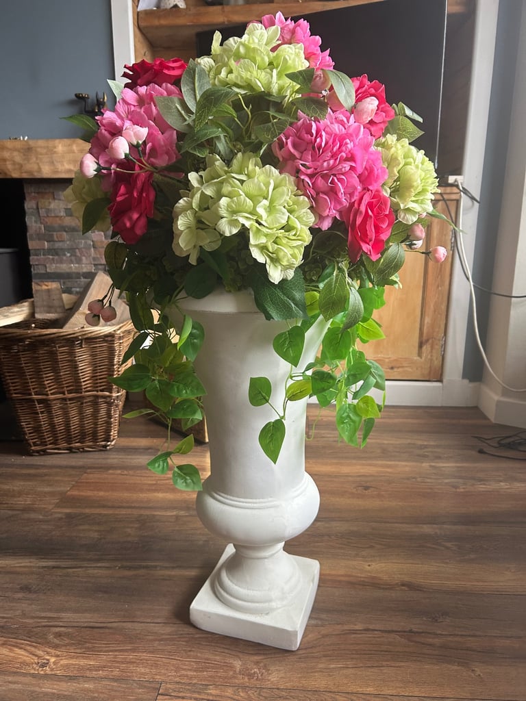 Artificial Flower Arrangement in stone pillar vase