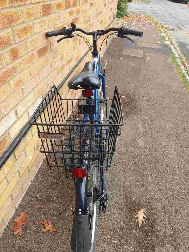 Lightweight Aluminium Apollo Transfer Hybrid bike in good condition with rear basket