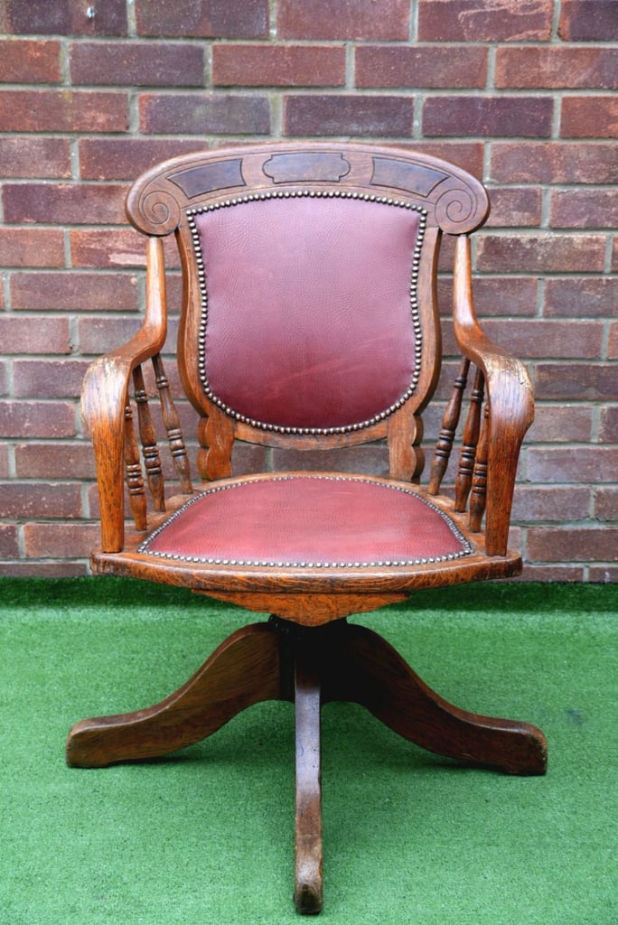 image for ANTIQUE OAK DESK CHAIR (1897-1921) HEYWOOD BROS. & WAKEFIELD CO.