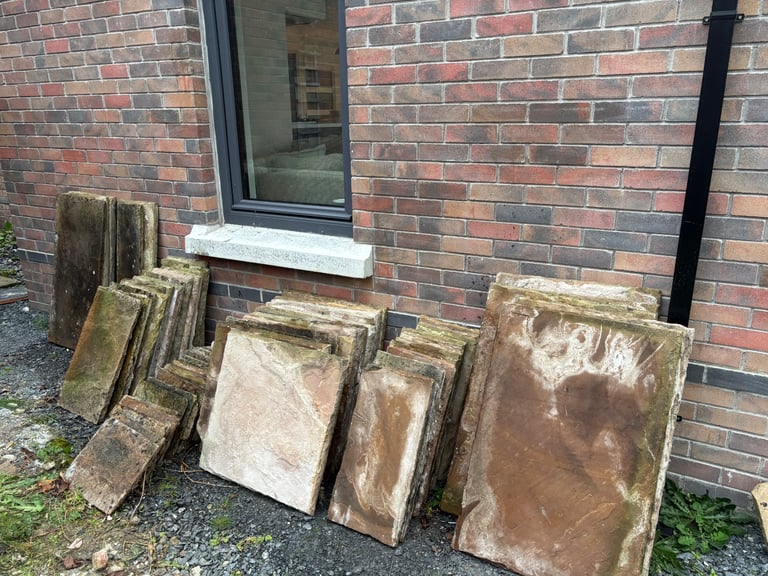 Reclaimed sandstone paving slabs. Approx 23sq metres