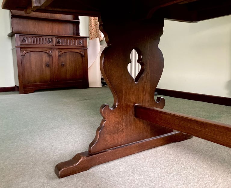 Dark mahogany finish dining table and six chairs