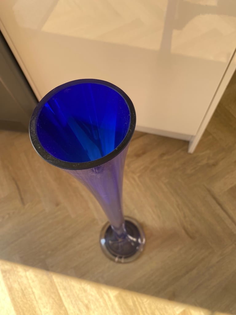 Blue glass tall vase. 