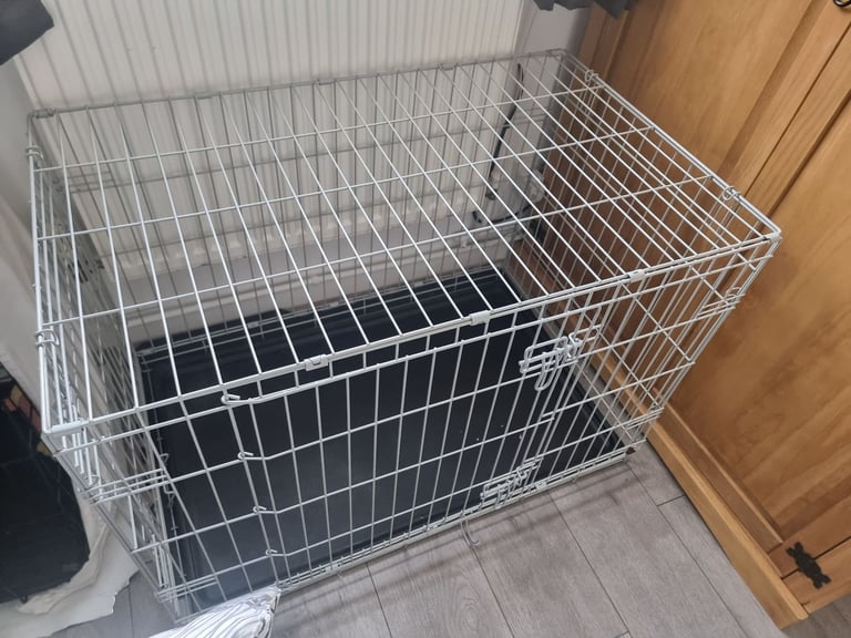 Medium double door folding dog crate gray.