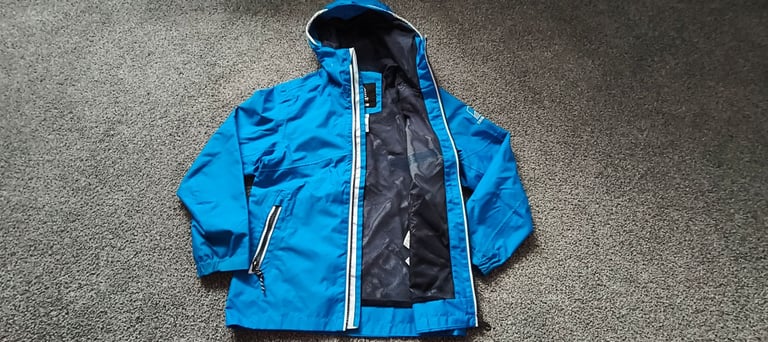 image for Tribord waterproof boys lightweight jacket age 7 -8