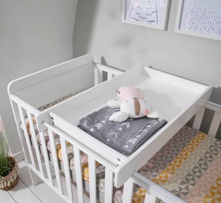 Cot bed and top changer 