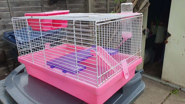 Pink animal cage