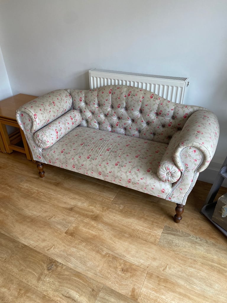 Ornate vintage small sofa