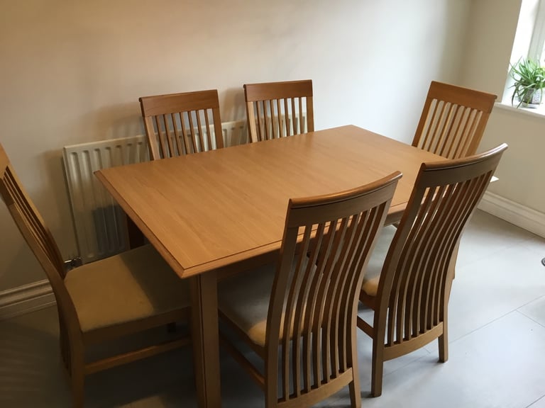 image for Extendable dining table and 6 chairs