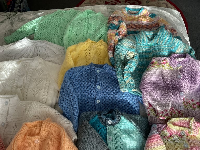 Baby cardigans/jackets etc, blankets and shawls, all hand knitted