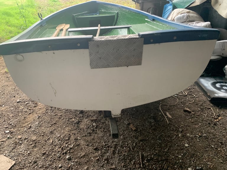 12 ft fibreglass boat and galvanised trailer 