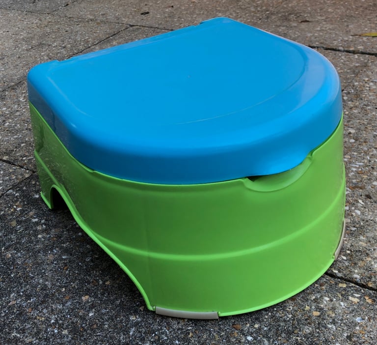 Potty with pot, seat and lid.