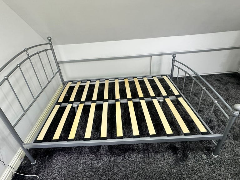 Metal double bed frame and memory foam mattress.