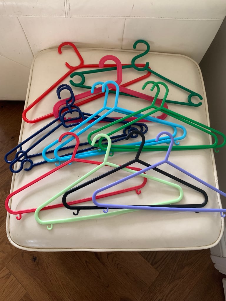 Bundle of plastic coat hangers - assorted colours